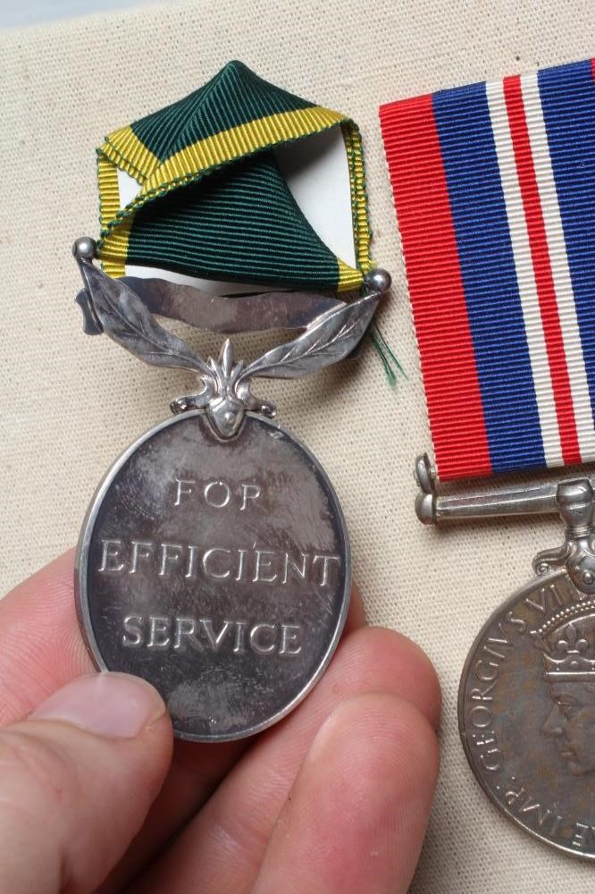 A GROUP OF FOUR MEDALS, comprising an India Efficiency Medal, a 1939-45 Star, a Burma Star and a Image