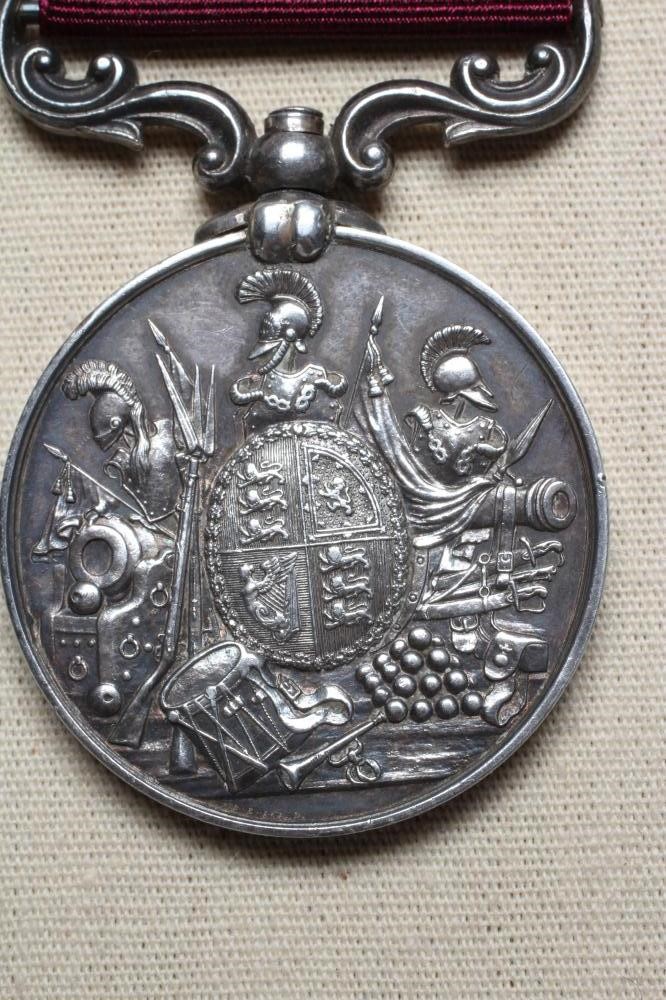 A VICTORIAN ARMY LONG SERVICE & GOOD CONDUCT MEDAL, 1st type, awarded to John Anderson of the 3rd Image