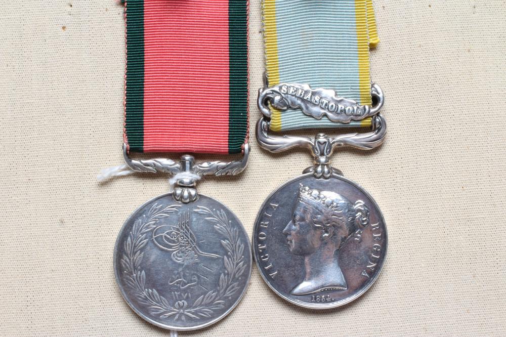 A PAIR OF CRIMEA MEDALS, comprising a Crimea medal 1854 medal with Sebastopol clasp and a Crimea Image