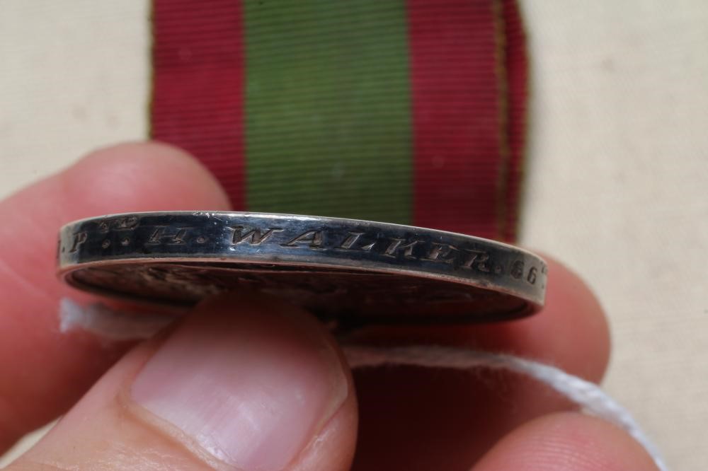 AN AFGHAN WAR MEDAL 1878-80 with Kandahar clasp, awarded to Harry Walker of the 66th Foot (Est. plus Image