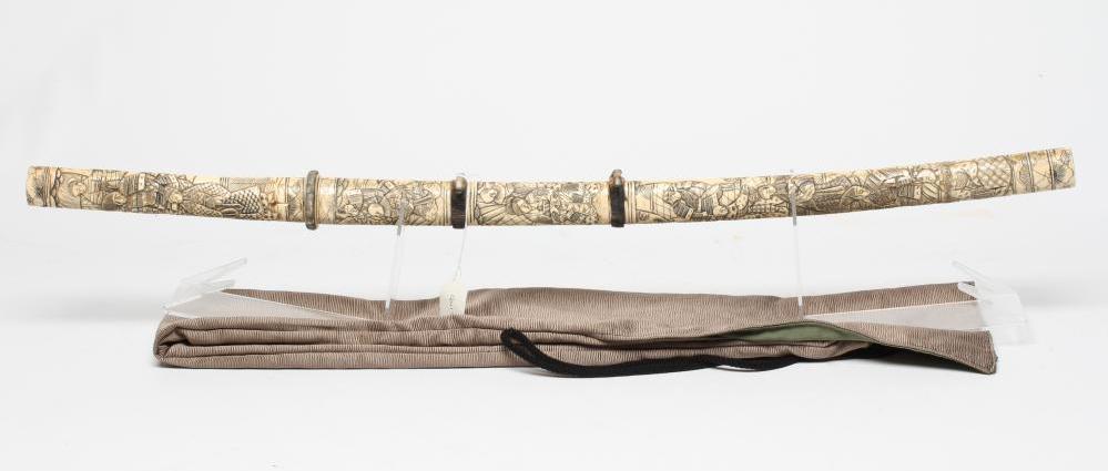 A JAPANESE BONE DECORATED WAKAZASHI with 20" curved blade Image