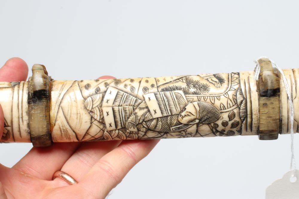 A JAPANESE BONE DECORATED WAKAZASHI with 20" curved blade Image