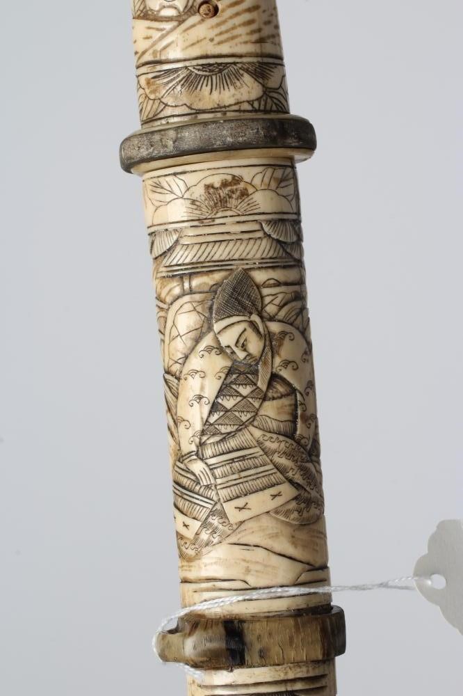 A JAPANESE BONE DECORATED WAKAZASHI with 20" curved blade Image