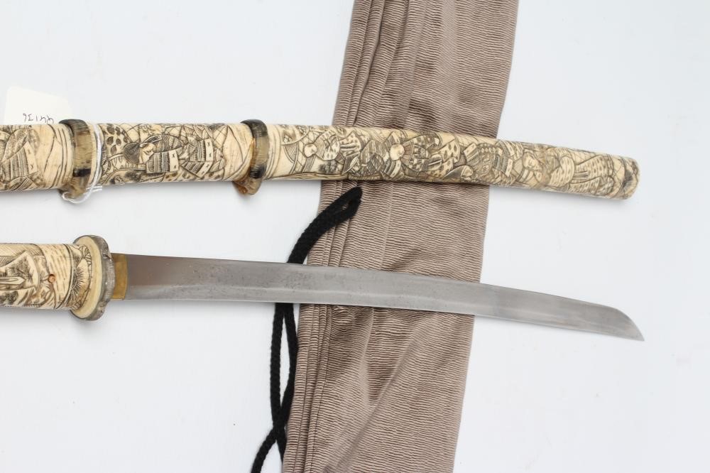 A JAPANESE BONE DECORATED WAKAZASHI with 20" curved blade Image