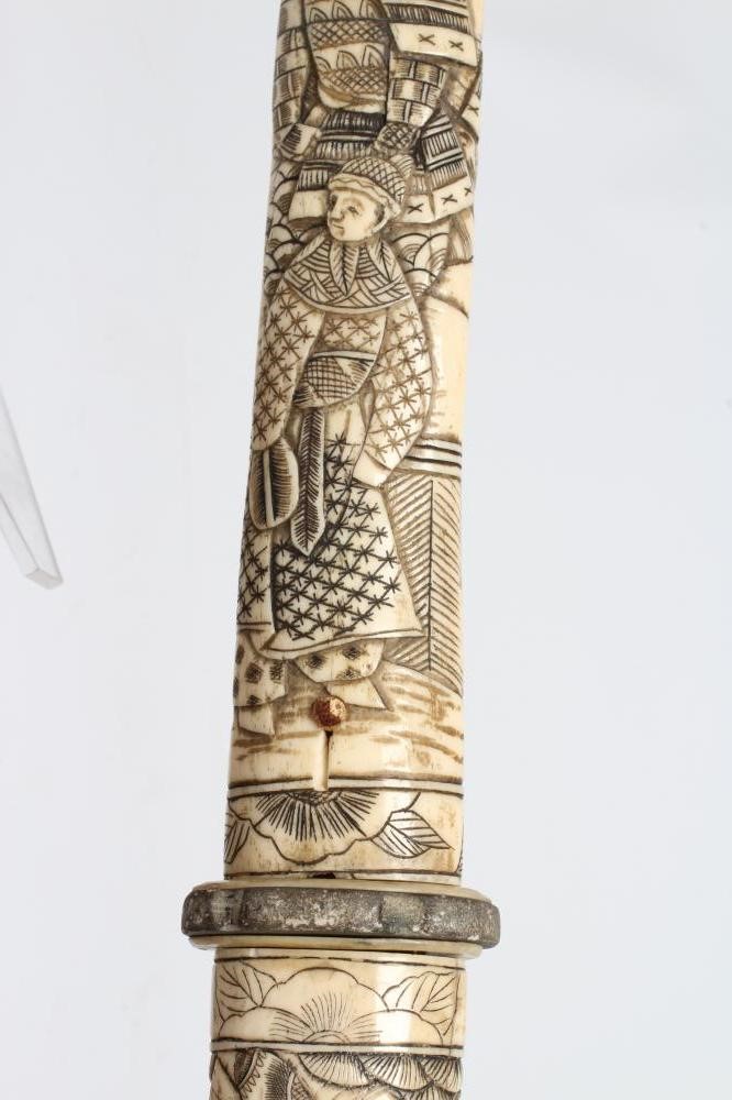 A JAPANESE BONE DECORATED WAKAZASHI with 20" curved blade Image