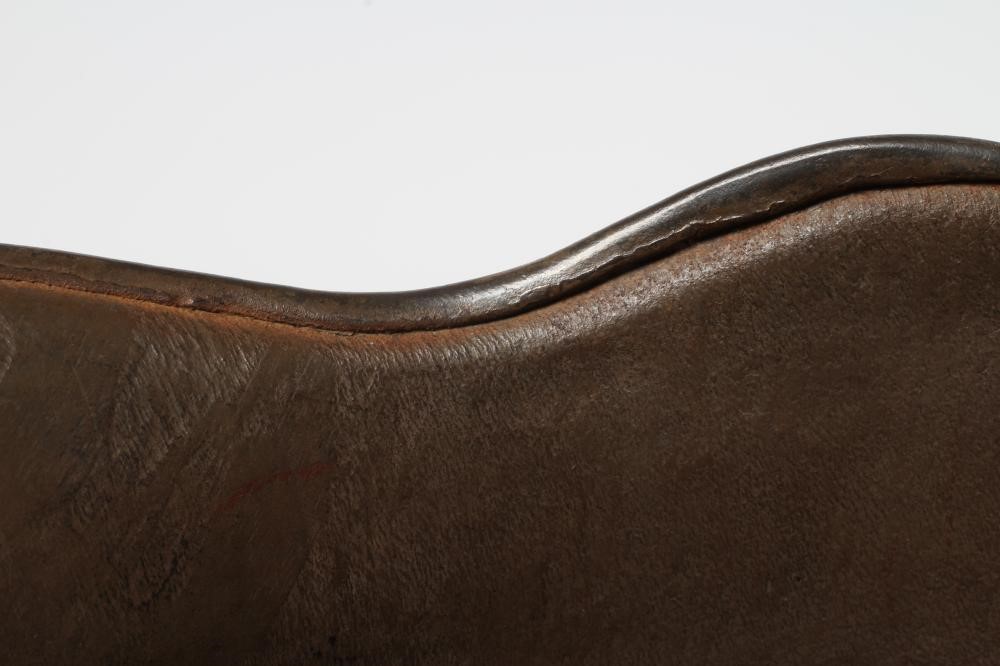 A GERMAN M16 STEEL HELMET with large external lugs and leather interior lining with strap (Est. plus Image