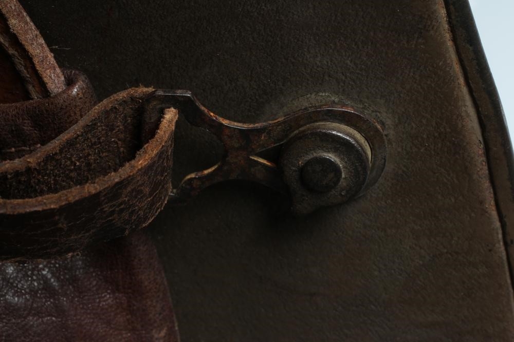 A GERMAN M16 STEEL HELMET with large external lugs and leather interior lining with strap (Est. plus Image