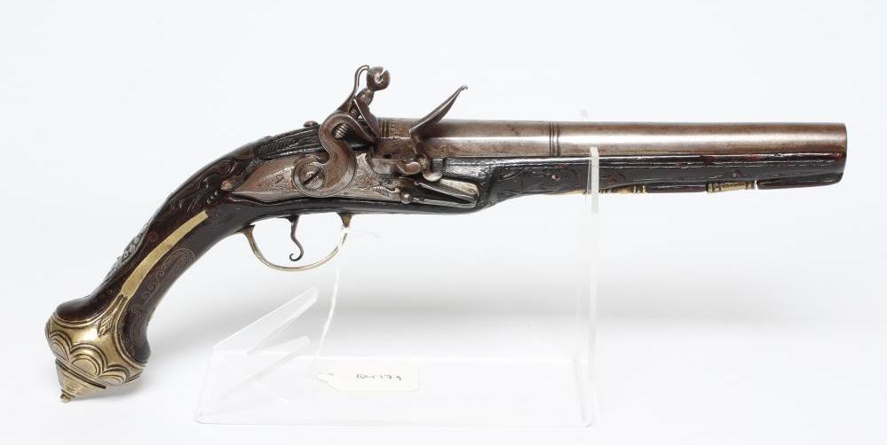 A FLINTLOCK PISTOL with 8 1/4" barrel, foliate etched lock, carved and white metal inlaid stock, Image