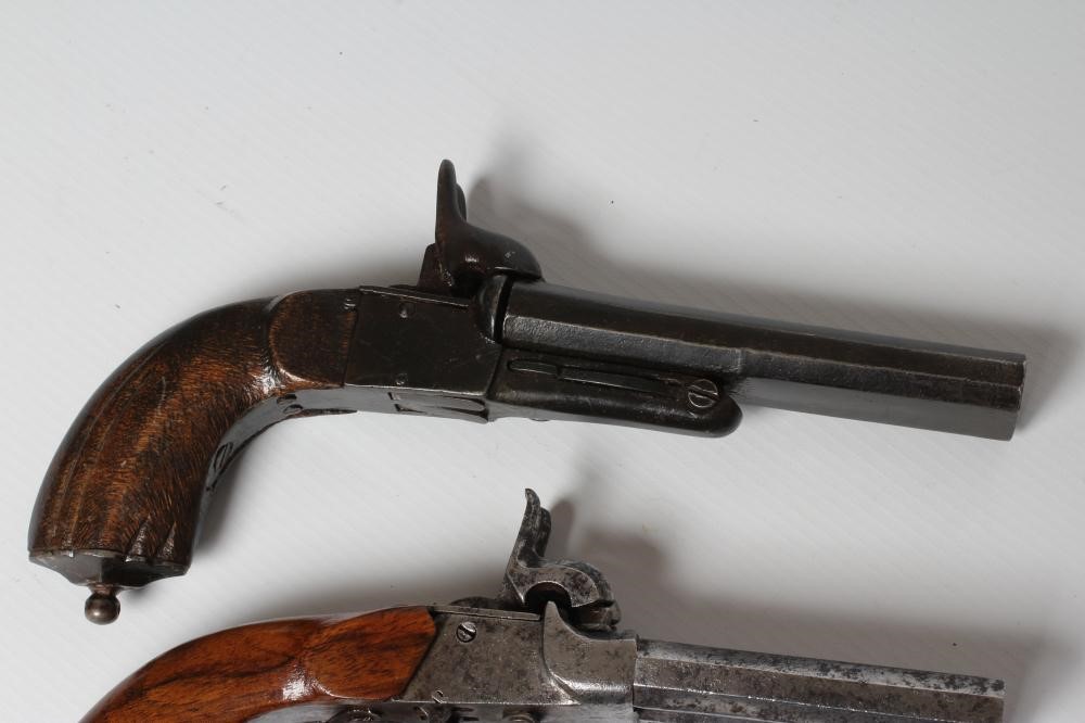 THREE ANTIQUE PISTOLS, comprising a European pinfire revolver, a double barrelled pinfire pistol and Image