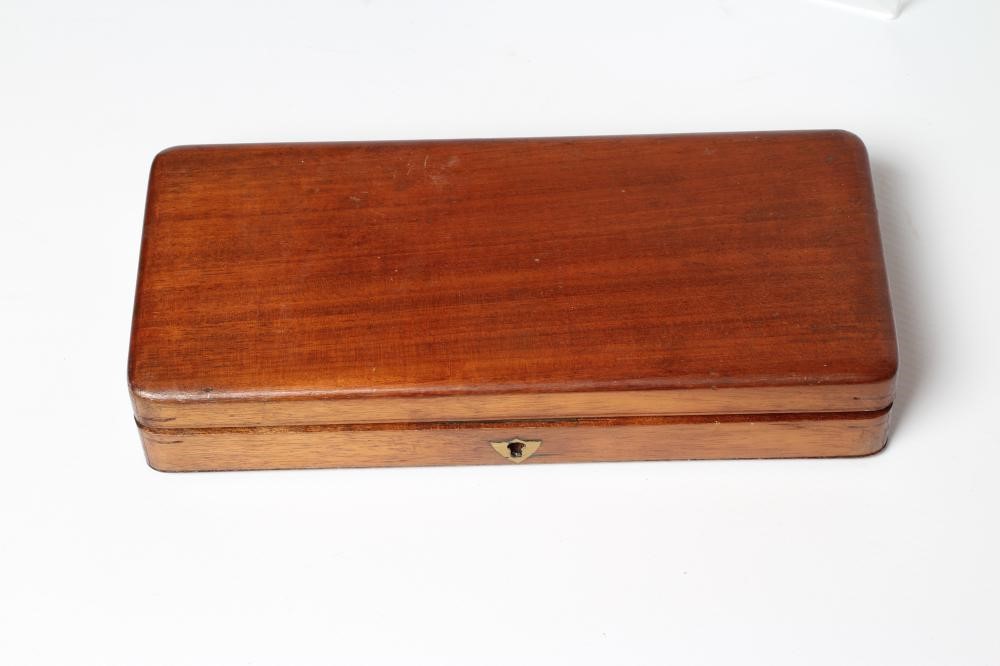 A CASED PERCUSSION POCKET PISTOL with 1 3/4" barrel, foliate etched action and walnut slab grip, 6" Image