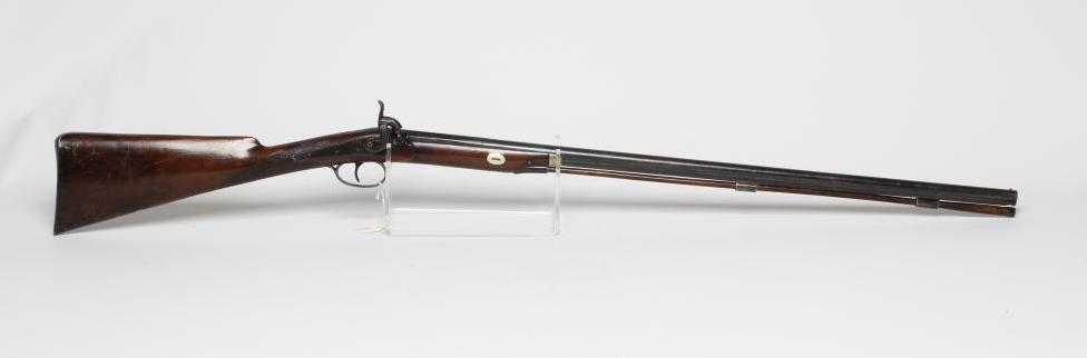 A PERCUSSION LADIES MUSKET, the 29 3/4" barrel octagonal at the breech, foliate etched action, steel Image