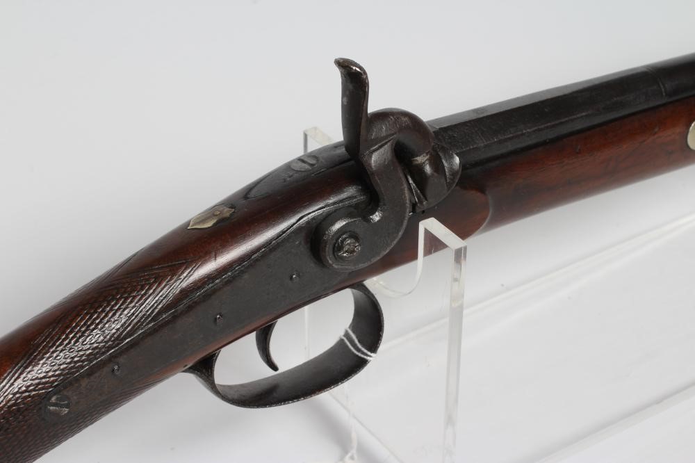 A PERCUSSION LADIES MUSKET, the 29 3/4" barrel octagonal at the breech, foliate etched action, steel Image