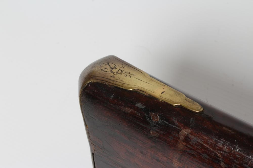 A FLINTLOCK MUSKET by Ward, the 26" barrel octagonal at the breech, walnut stock, brass furniture Image