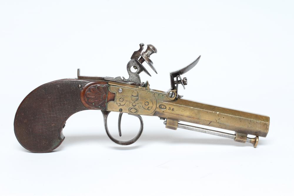 A BRASS FLINTLOCK TOP ACTION PISTOL with 3 1/2" octagonal barrel Image