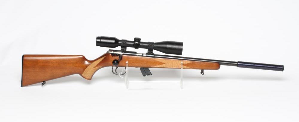 AN ANSCHUTZ .22LR BOLT ACTION RIFLE with 13" bull barrel, moderator, manual safety, ten shot Image