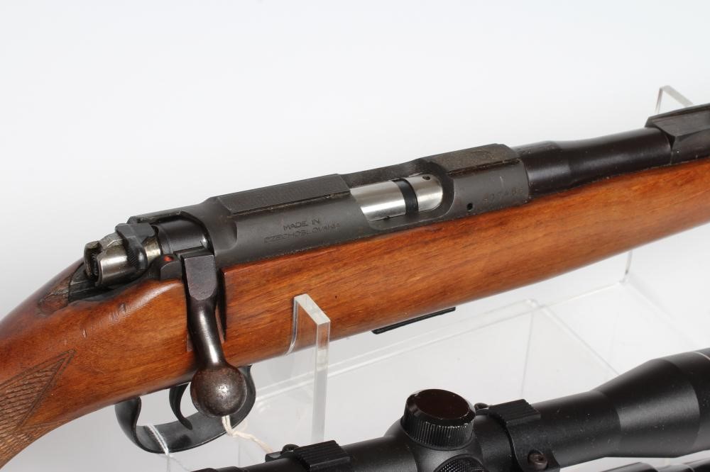 TWO .22LR RIFLES, comprising a rare open bolt semi-automatic Mauser 105 rifle and scope, and a BRNO Image