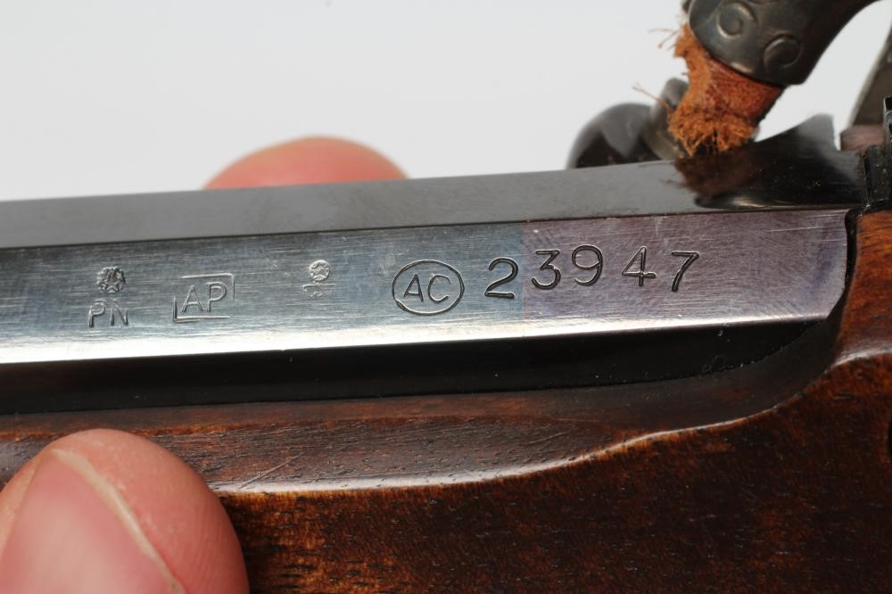 AN ARMI SPORT PERCUSSION .45 TARGET PISTOL with 10 1/4" octagonal barrel, stepped action, chequered Image