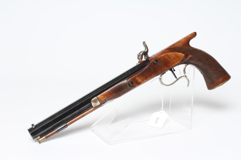 AN ARMI SPORT PERCUSSION .45 TARGET PISTOL with 10 1/4" octagonal barrel, stepped action, chequered Image