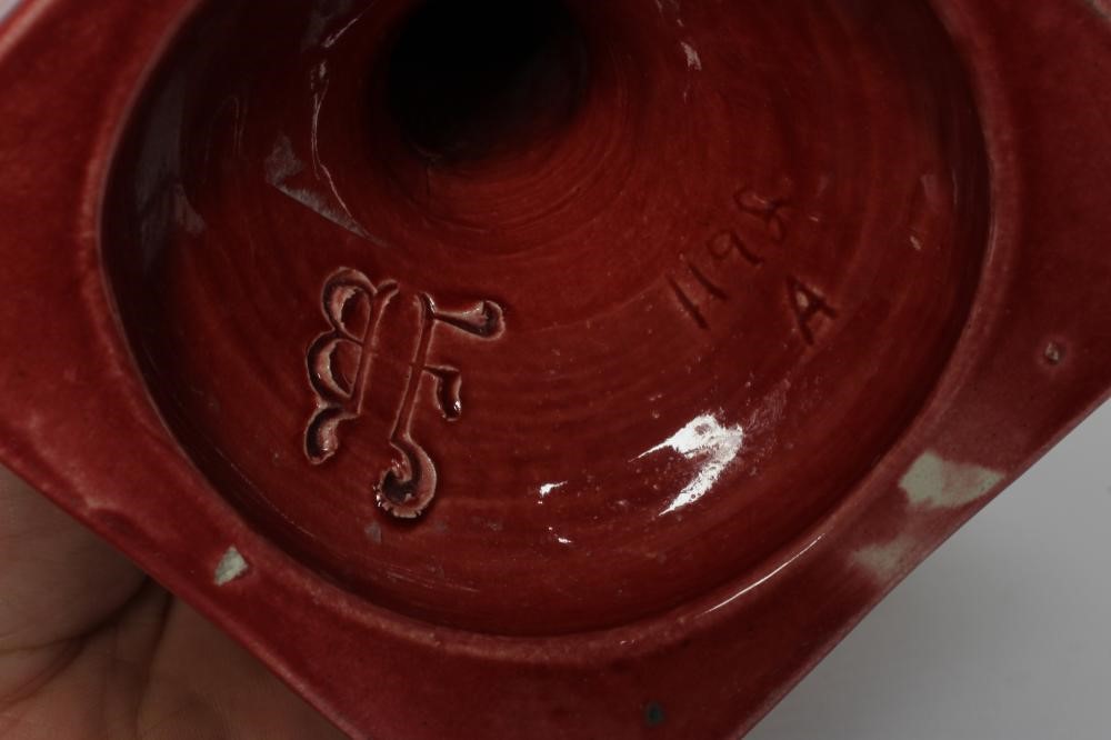 A PAIR OF BURMANTOFTS PINK GLAZED FAIENCE CORINTHIAN COLUMN CANDLESTICKS, c.1900, with fixed sconces Image