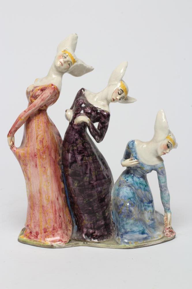 AN EARTHENWARE FIGURE GROUP Image