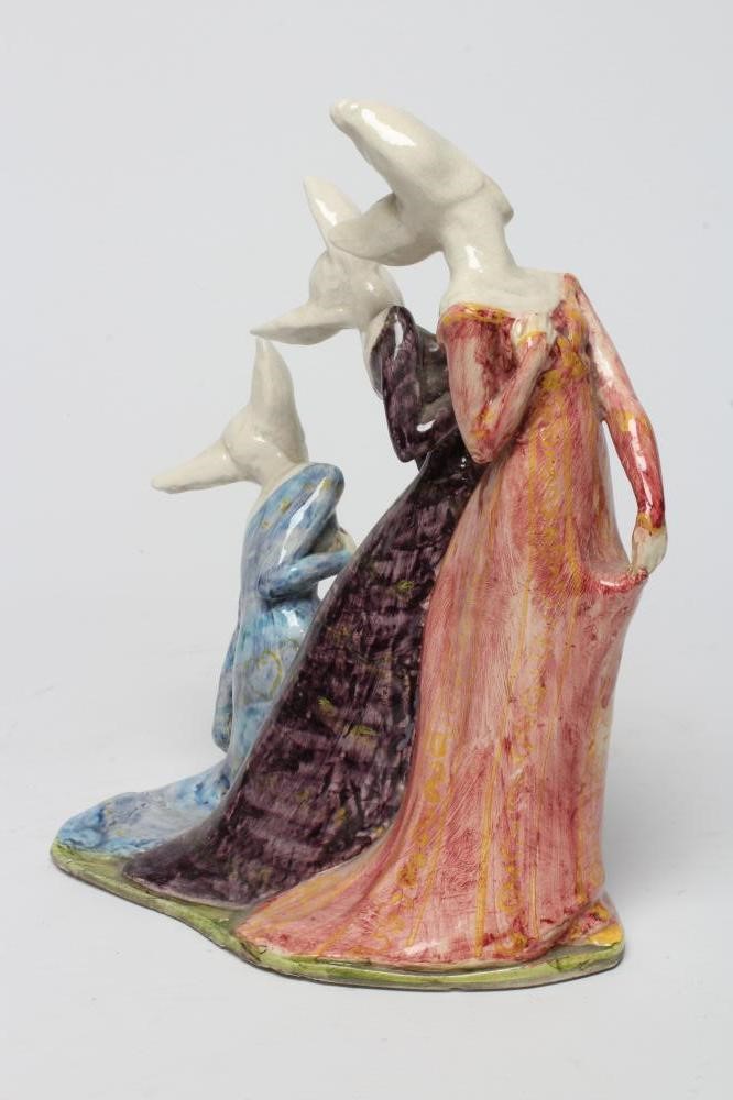 AN EARTHENWARE FIGURE GROUP Image