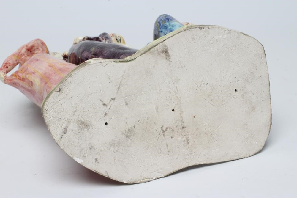 AN EARTHENWARE FIGURE GROUP Image