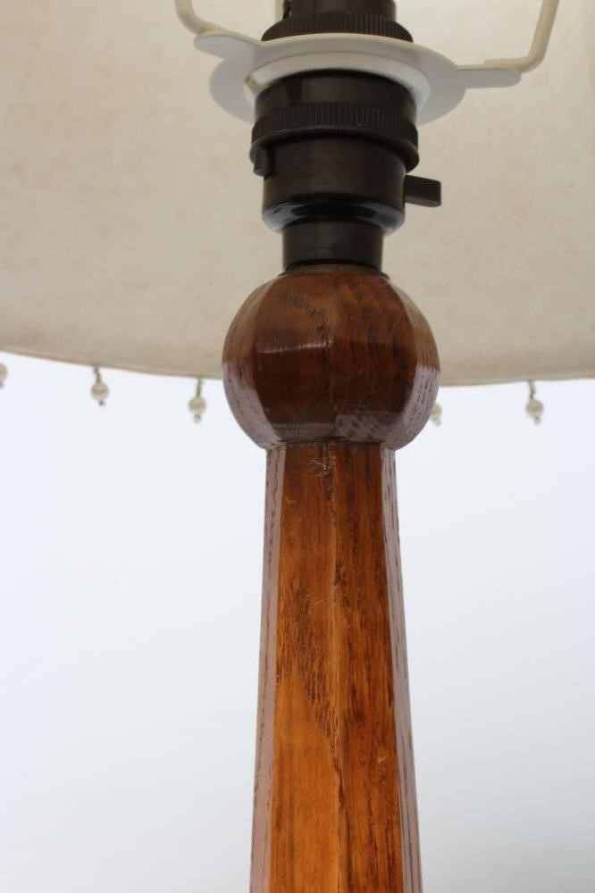 A ROBERT THOMPSON OAK TABLE LAMP Image