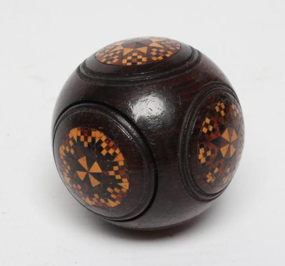 AN EARLY VICTORIAN TUNBRIDGEWARE SOVEREIGN HOLDER/PUZZLE BALL of typical form with central push-out Image