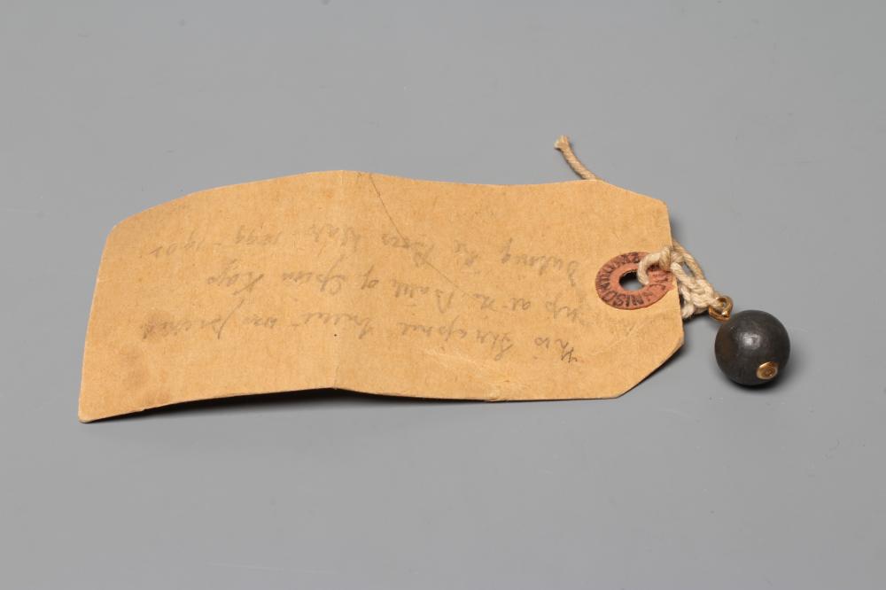 OF BOER WAR INTEREST - a lead bullet from the Battle at Spion Kop, drilled and mounted as a fob, Image