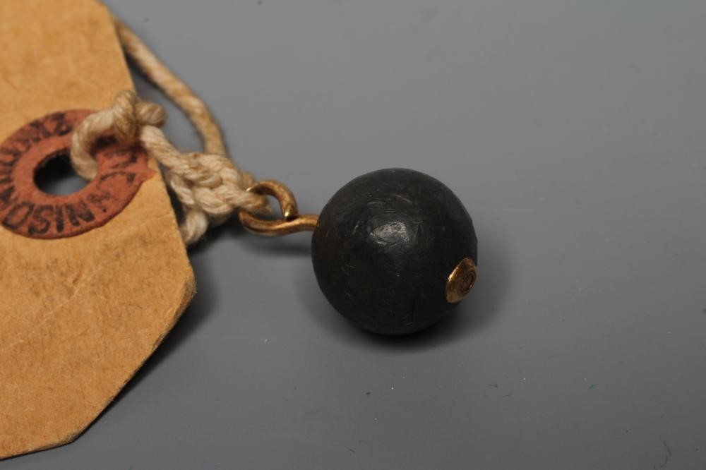 OF BOER WAR INTEREST - a lead bullet from the Battle at Spion Kop, drilled and mounted as a fob, Image