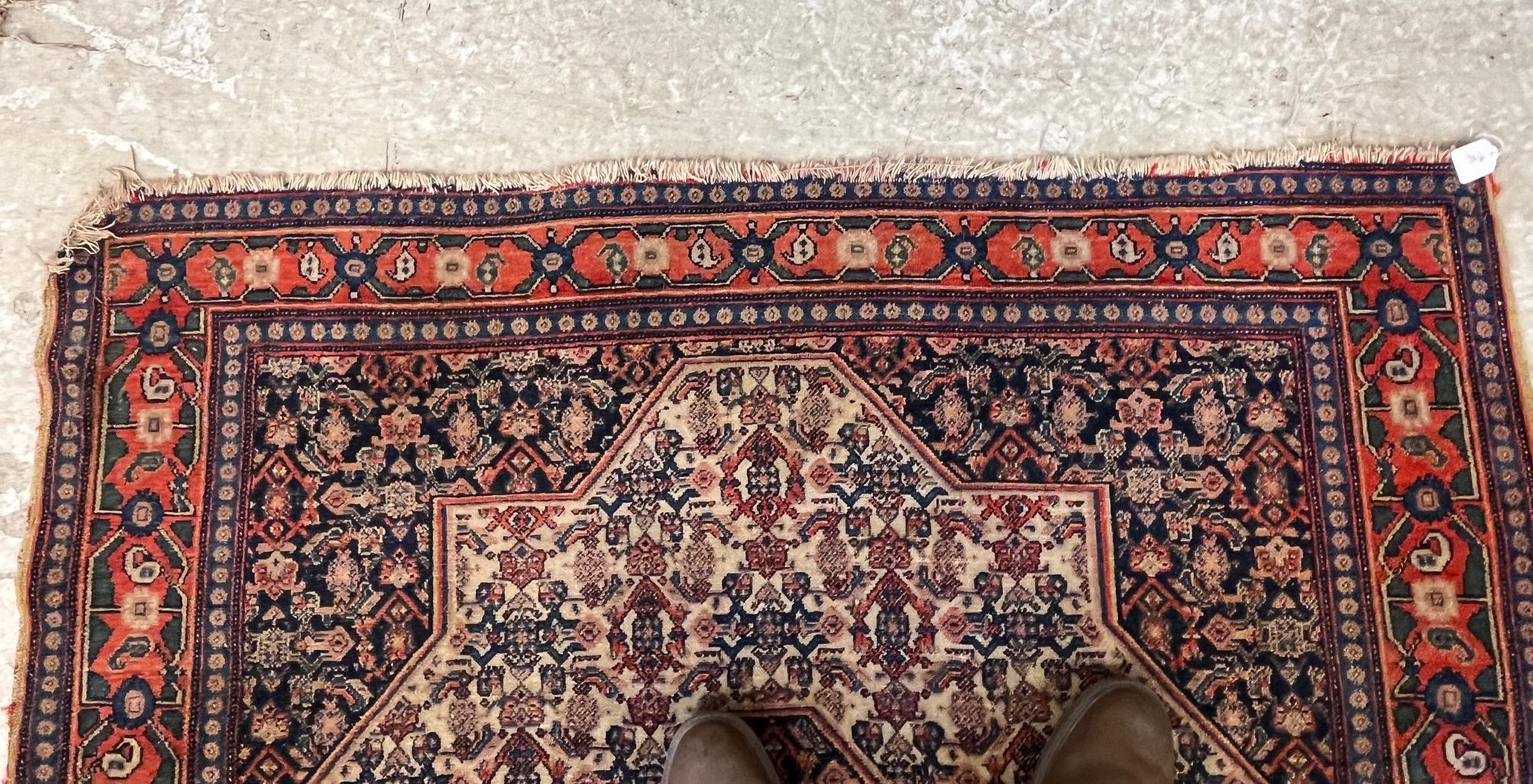 A PERSIAN RUG Image