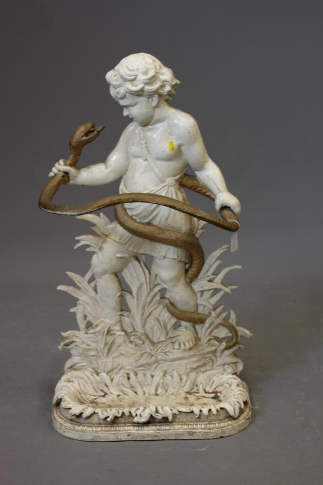 A VICTORIAN CAST IRON STICK STAND modelled as young Hercules with serpent, the base with leaf Image