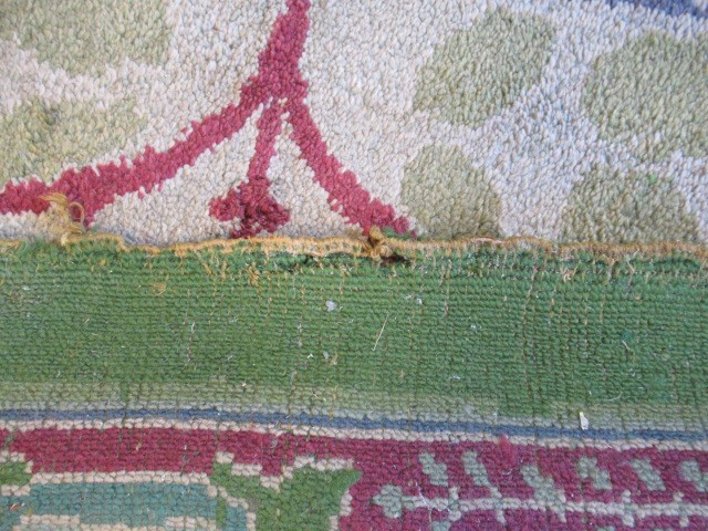 AN ARTS AND CRAFTS WOOL CARPET Image