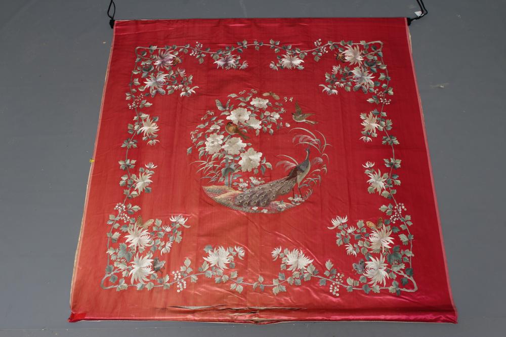 A LARGE CHINESE PINK SILK PANEL embroidered in coloured silks with a central roundel of a pair of Image