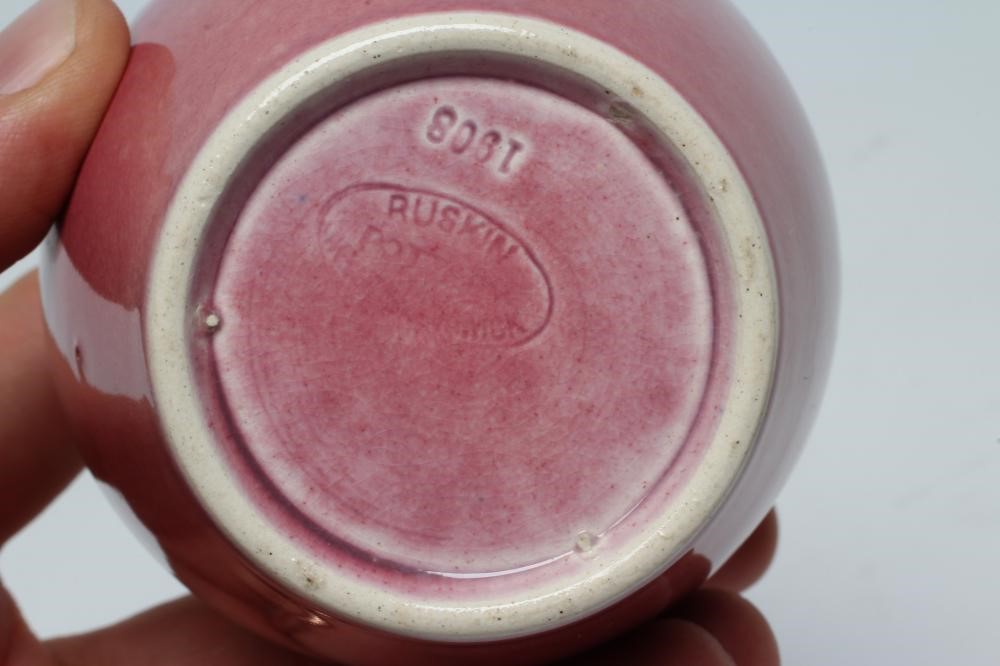 A RUSKIN PINK GLAZED EARTHENWARE SMALL POT POURRI, 1908, of ovoid form, the rounded shoulders Image