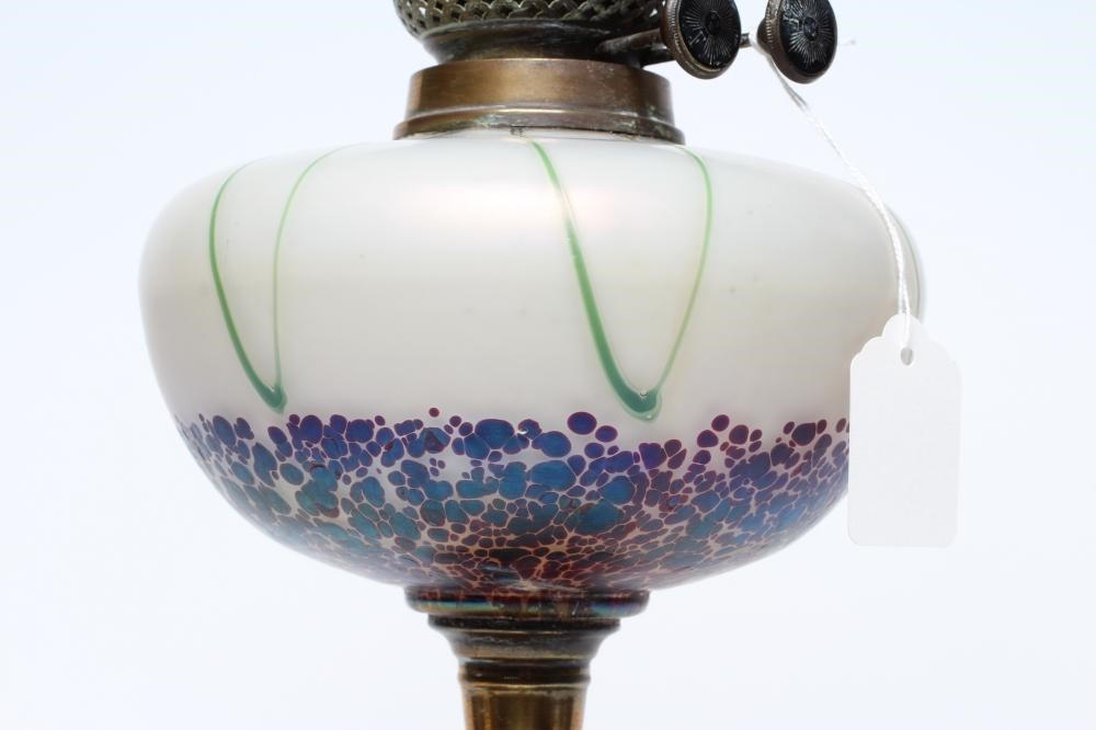 AN EDWARDIAN ART NOUVEAU DOUBLE WICK OIL LAMP with glass reservoir and etched flared glass shade on Image