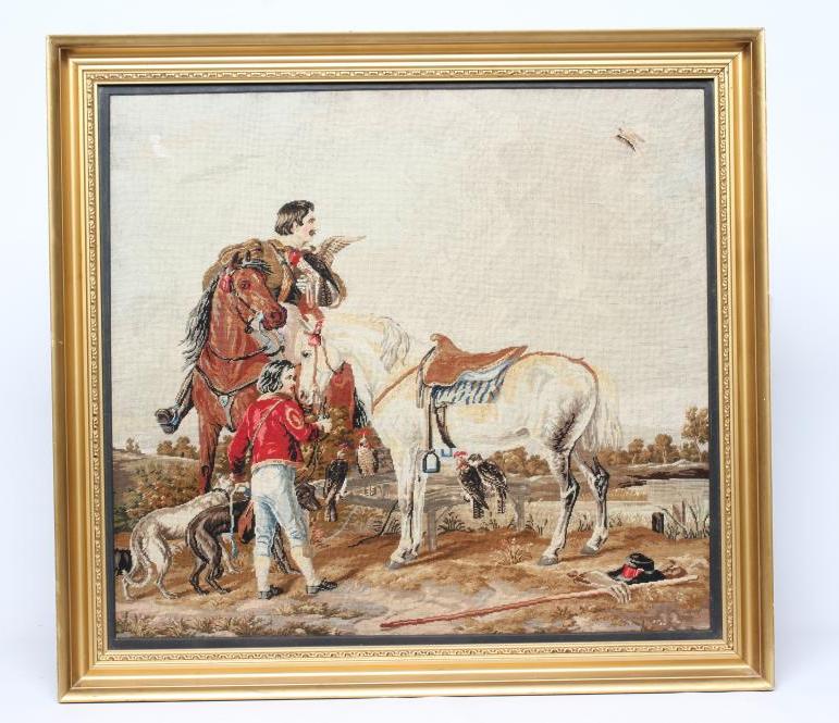 A VICTORIAN WOOLWORK PICTURE worked in half cross stitch with a Falconer seated astride his steed Image