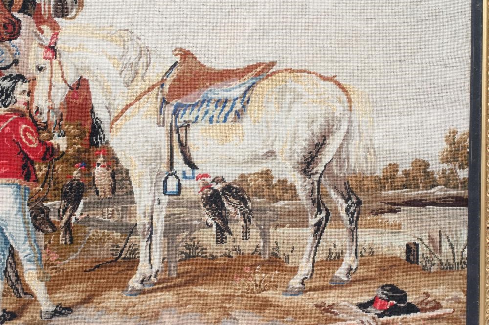 A VICTORIAN WOOLWORK PICTURE worked in half cross stitch with a Falconer seated astride his steed Image