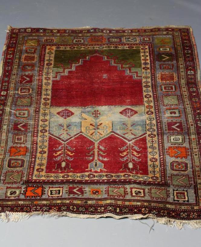 AN ANATOLIAN (?) TRIBAL PRAYER RUG Image