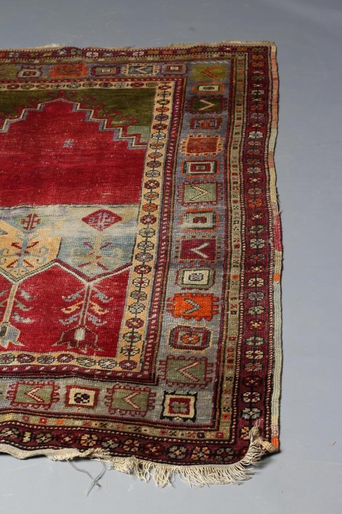 AN ANATOLIAN (?) TRIBAL PRAYER RUG Image