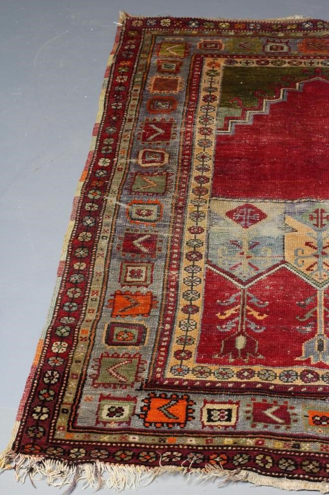 AN ANATOLIAN (?) TRIBAL PRAYER RUG Image