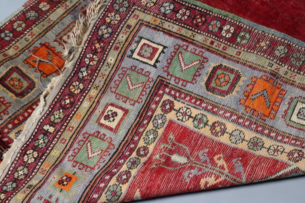 AN ANATOLIAN (?) TRIBAL PRAYER RUG Image