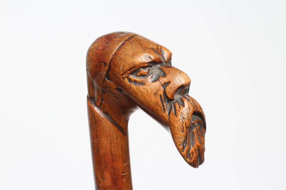 EIGHT WALKING STICKS Image