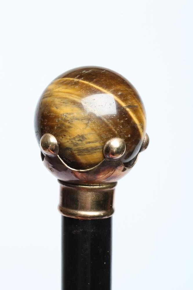 EIGHT WALKING STICKS Image