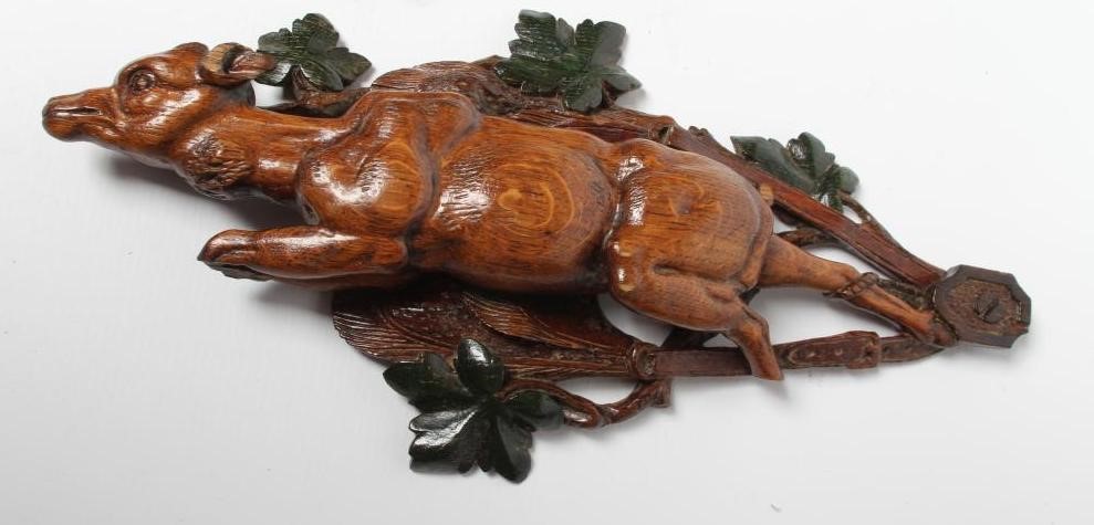 THREE EUROPEAN CARVED AND STAINED OAK WALL APPLIQUES, early 20th century, depicting hanging game Image