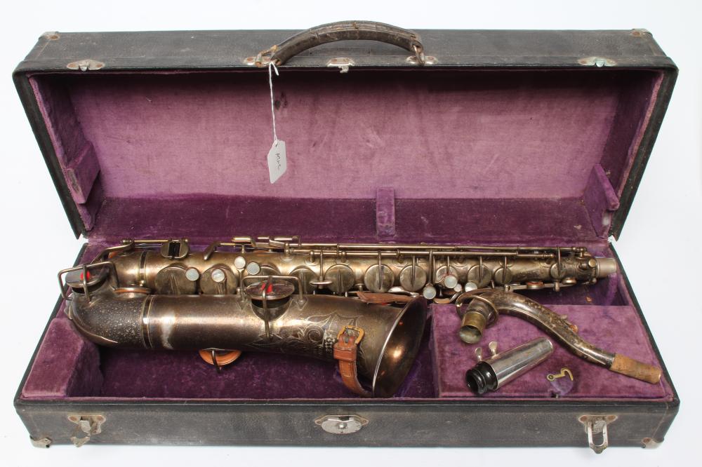 A BUESCHER SILVER PLATED SAXOPHONE, C-Melody, marked Low Pitch, with True-Tone logo and reg. no. Image