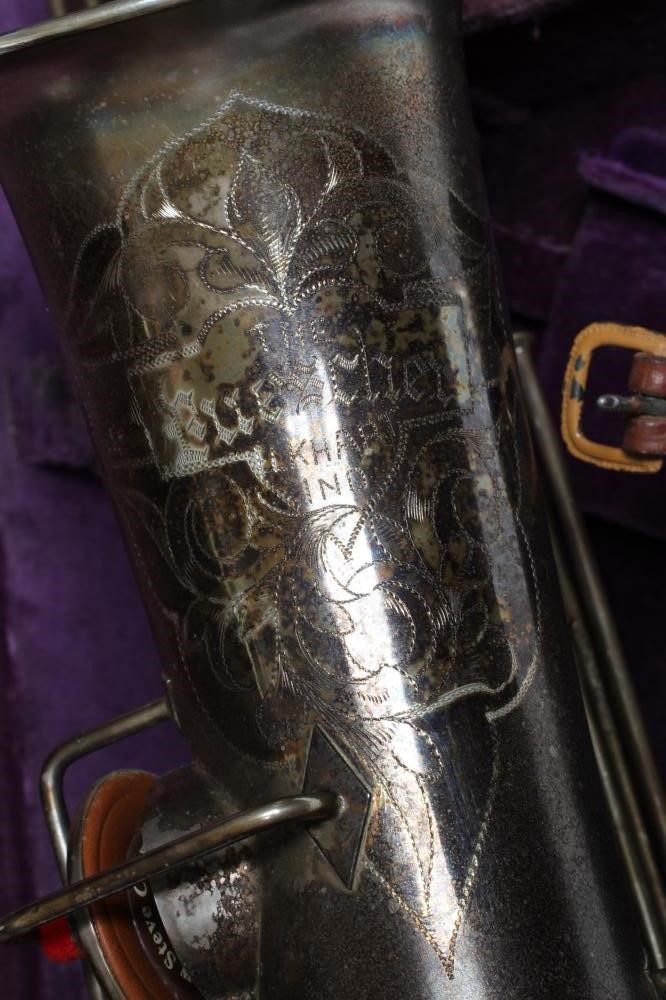 A BUESCHER SILVER PLATED SAXOPHONE, C-Melody, marked Low Pitch, with True-Tone logo and reg. no. Image