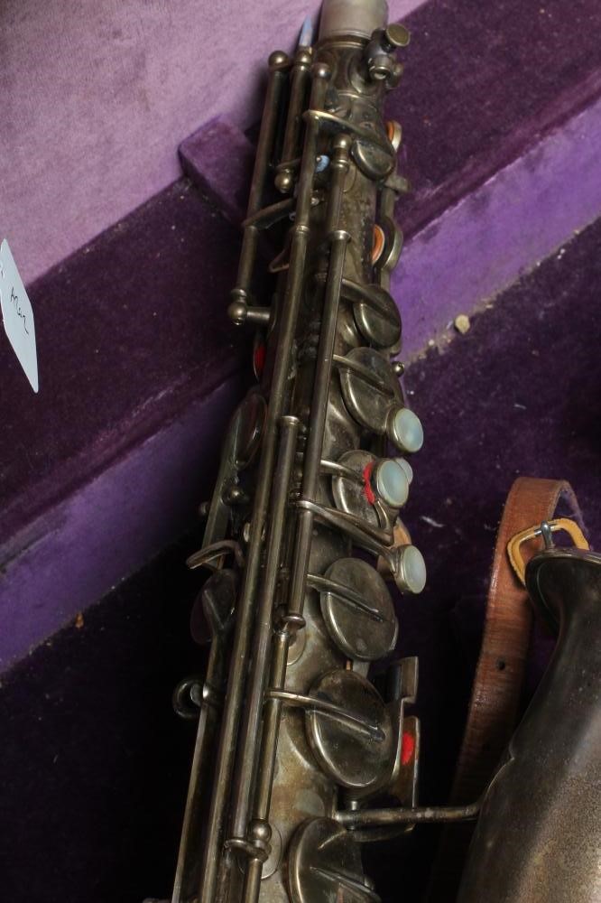 A BUESCHER SILVER PLATED SAXOPHONE, C-Melody, marked Low Pitch, with True-Tone logo and reg. no. Image