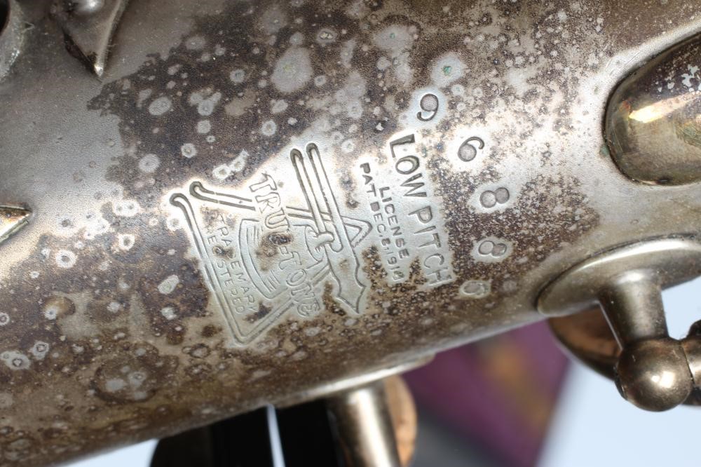 A BUESCHER SILVER PLATED SAXOPHONE, C-Melody, marked Low Pitch, with True-Tone logo and reg. no. Image