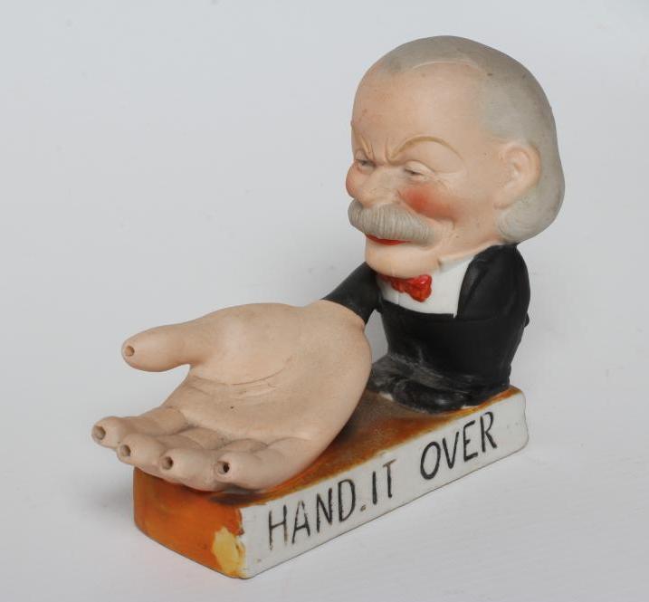 OF BRITISH POLITICAL INTEREST- a German bisque porcelain novelty match holder Image
